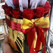 خرید آنلاین و اینترنتی باکی گل طلایی رز قرمز و جعبه استوانه ای در تهران از گلفروش و فروشگاه انلاین شادیچی