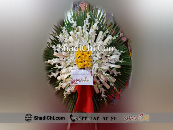 عکس تاج گل نمایشگاهی برای تشکر یک طبقه با گل ژبرا